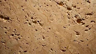 Full-frame beige travertine stone texture with natural pores, soft veins and a warm matte finish